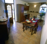 Kitchen and dining area of the Shakespeare Apartment