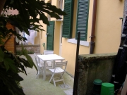 Outside area with table and chairs