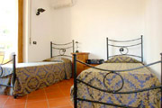 Wohnungen Florenz Italien: Schlafzimmer mit zwei Einzelbetten der Wohnung Bonciani in Florenz Italien